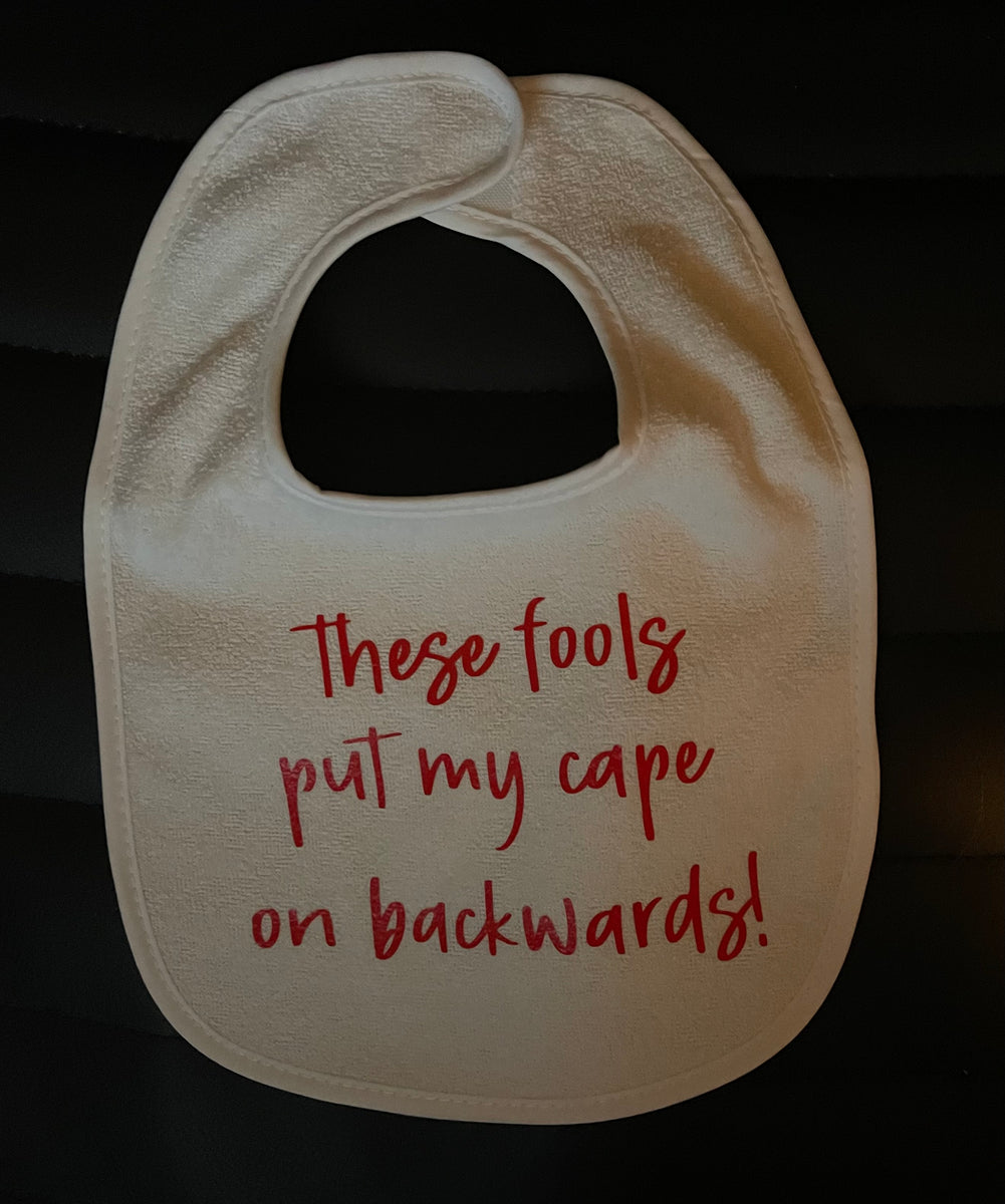 Cape on backwards sales bib