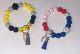 Variety Of Sports Themed Beaded Wristlets With 2" (D) Wooden Or Acrylic Charms